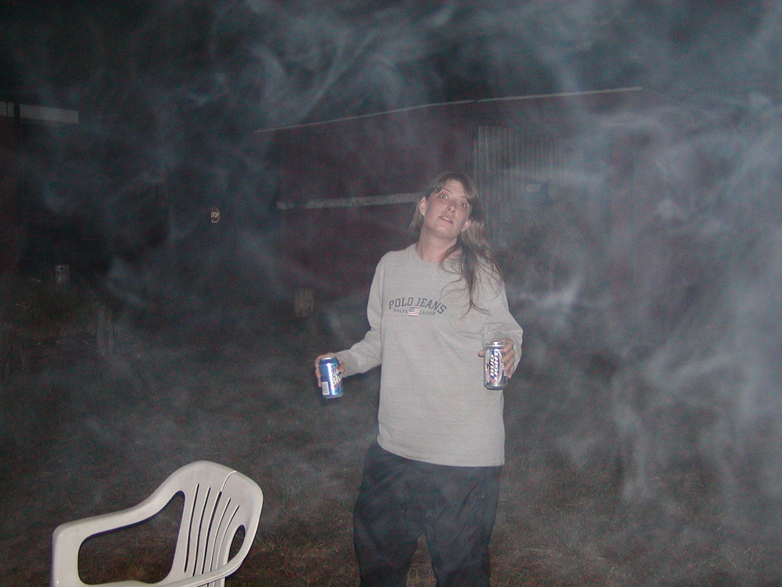 Shelley magically appears out of the smoke.