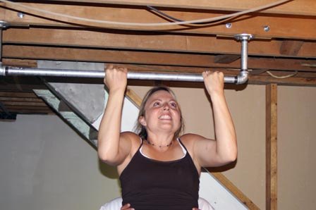 Pull ups!  (Yeah right...Joe has her legs!)