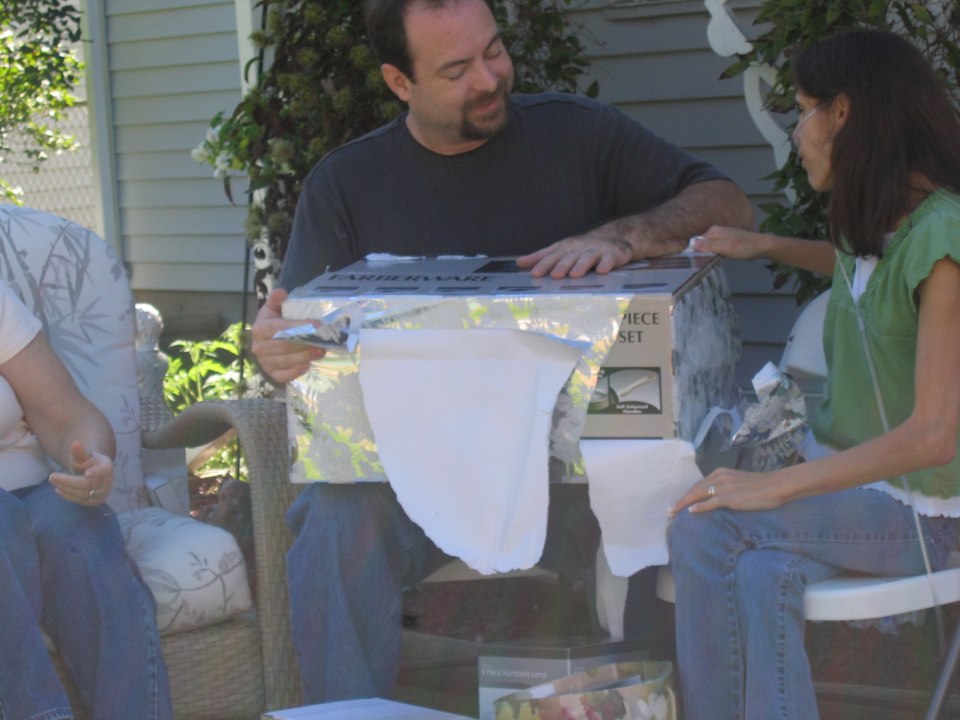 Opening gifts, photograph 13