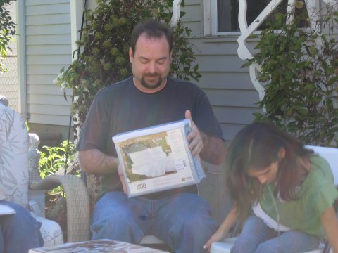Opening gifts, photograph 19