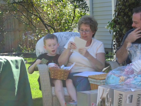 Opening gifts, photograph 29