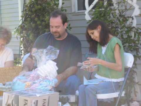 Opening gifts, photograph 26