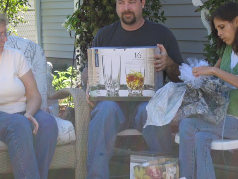Opening gifts, photograph 12