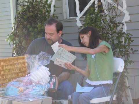 Opening gifts, photograph 25